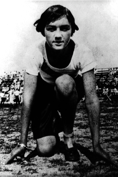 School picture of Marce Herz poised to begin a race.