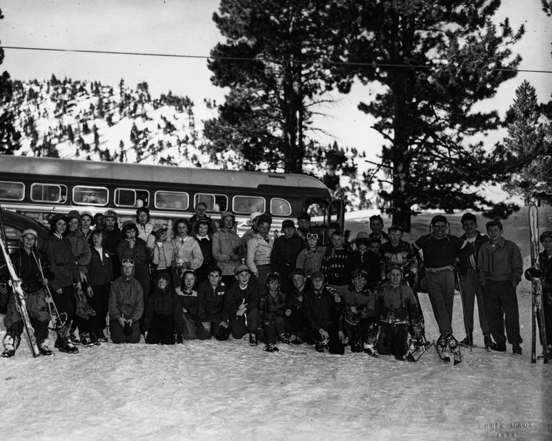 Children with school bus at Sky Tavern, Reno, Nevada.
